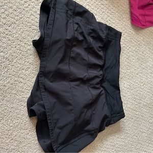 Black lululemon mid rise pace rival tennis skirt size 0